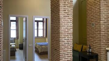 Luxury 2-bdr Apartment Historic Building | Living area | 42-cm flat-screen TV with satellite channels, TV