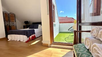 2 habitaciones, tabla de planchar con plancha y ropa de cama