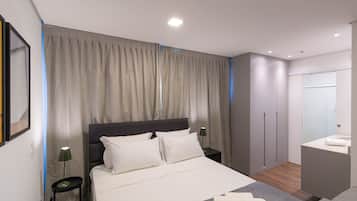 A modern bedroom with a large bed, a nightstand, a bedside table, a wardrobe, and a bathroom with a mirror and sink.