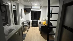 Living area - “Tiny Two” (Private hot tub). (Meteghan River)