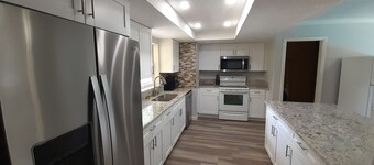 2 houses 5bed 4bath heated pool prime location