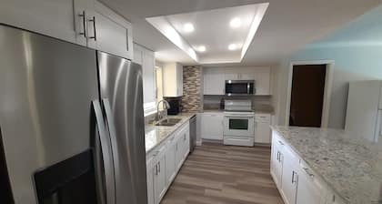 2 houses 5bed 4bath heated pool prime location