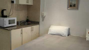 9 quartos, ferros/tábuas de passar roupa, Wi-Fi, roupa de cama