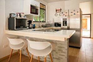 Microwave, oven, stovetop, coffee/tea maker