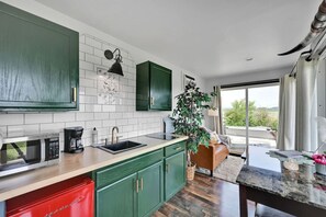 Fridge, microwave, stovetop, coffee/tea maker