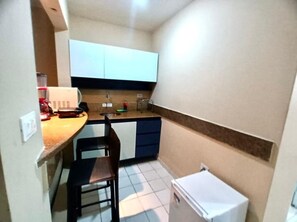 Estúdio | Cozinha privada | Frigobar, micro-ondas