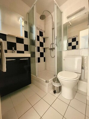 Hair dryer, towels, soap, toilet paper