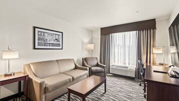 Suite, Non Smoking (Single King Extended Stay) | Down comforters, pillowtop beds, desk, laptop workspace