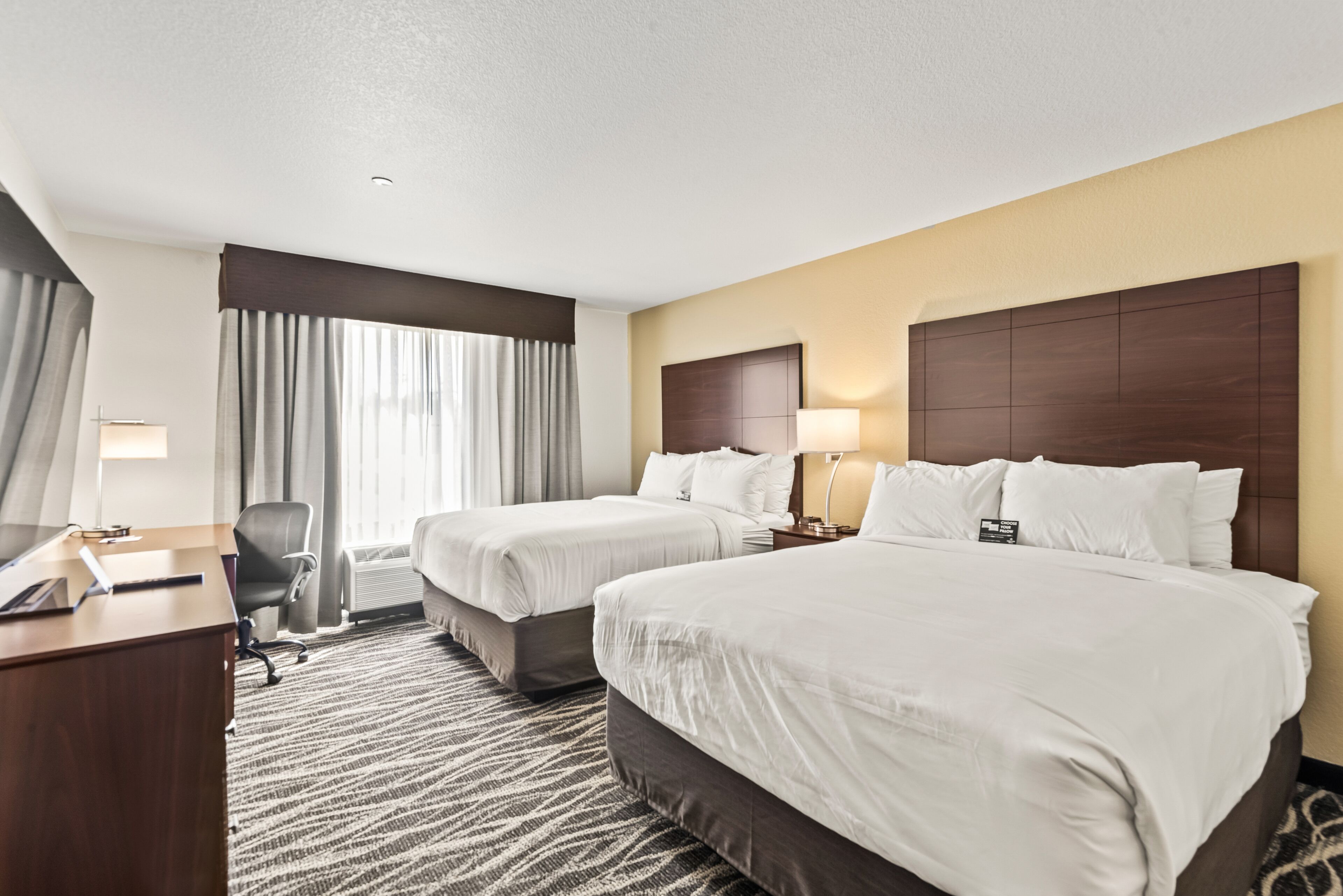 Down duvets, pillow-top beds, desk, laptop workspace