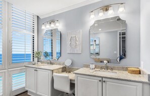 Bathtub, hair dryer, towels, soap