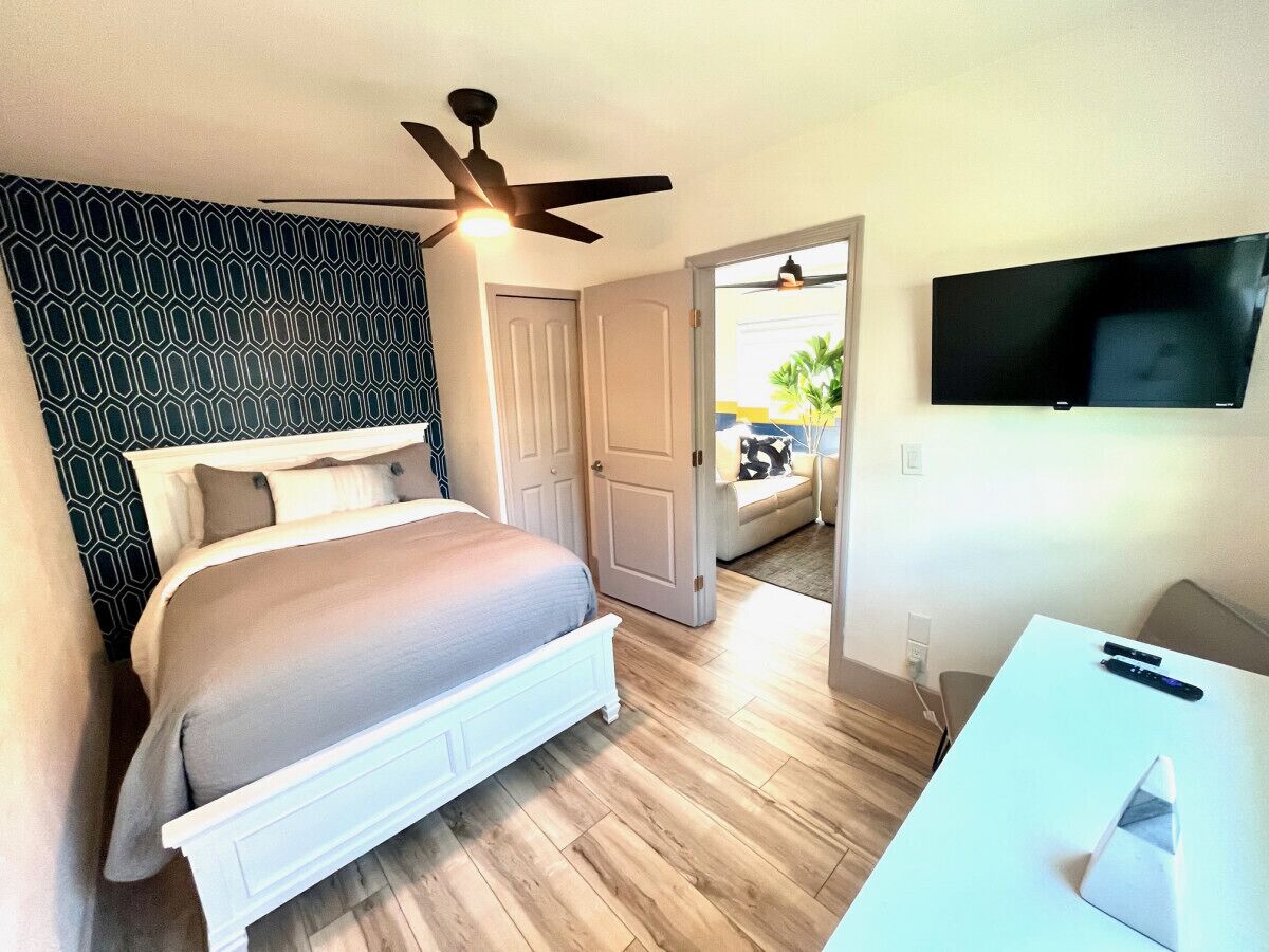 2 bedrooms, desk, iron/ironing board, travel cot