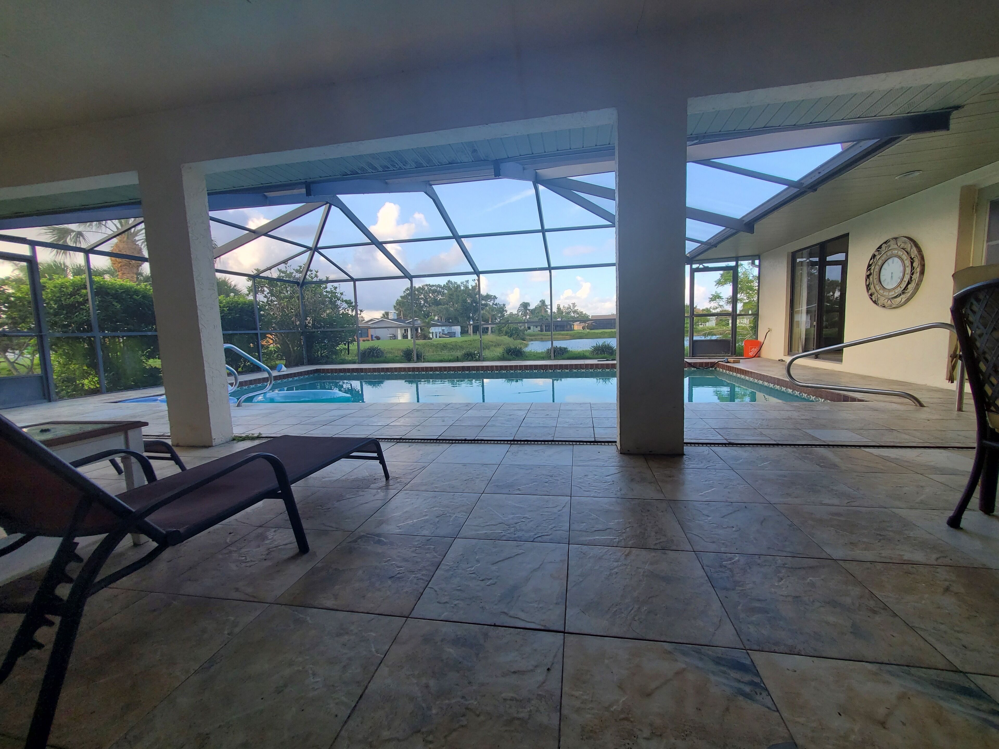 Venice 3 Bedroom Waterfront Home with Pooled Lanai for short term rental