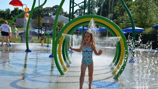 A water play area with multiple water jets and arches.