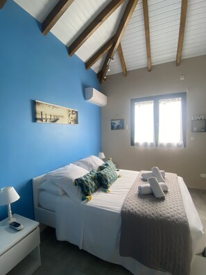 4 عدّة غرف نوم وخزنة داخل الغرفة ومكواة/لوح كي وواي فاي