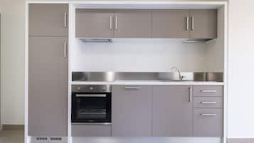 Fridge, oven, dishwasher, dining tables