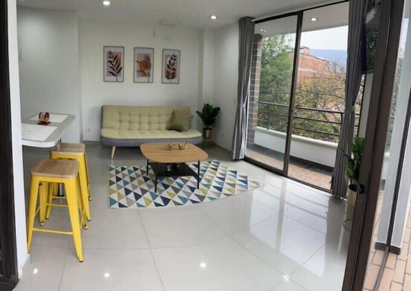 Living area - Lovely 1-bedroom apartment in Medellin Piso 4 (Barranquilla)