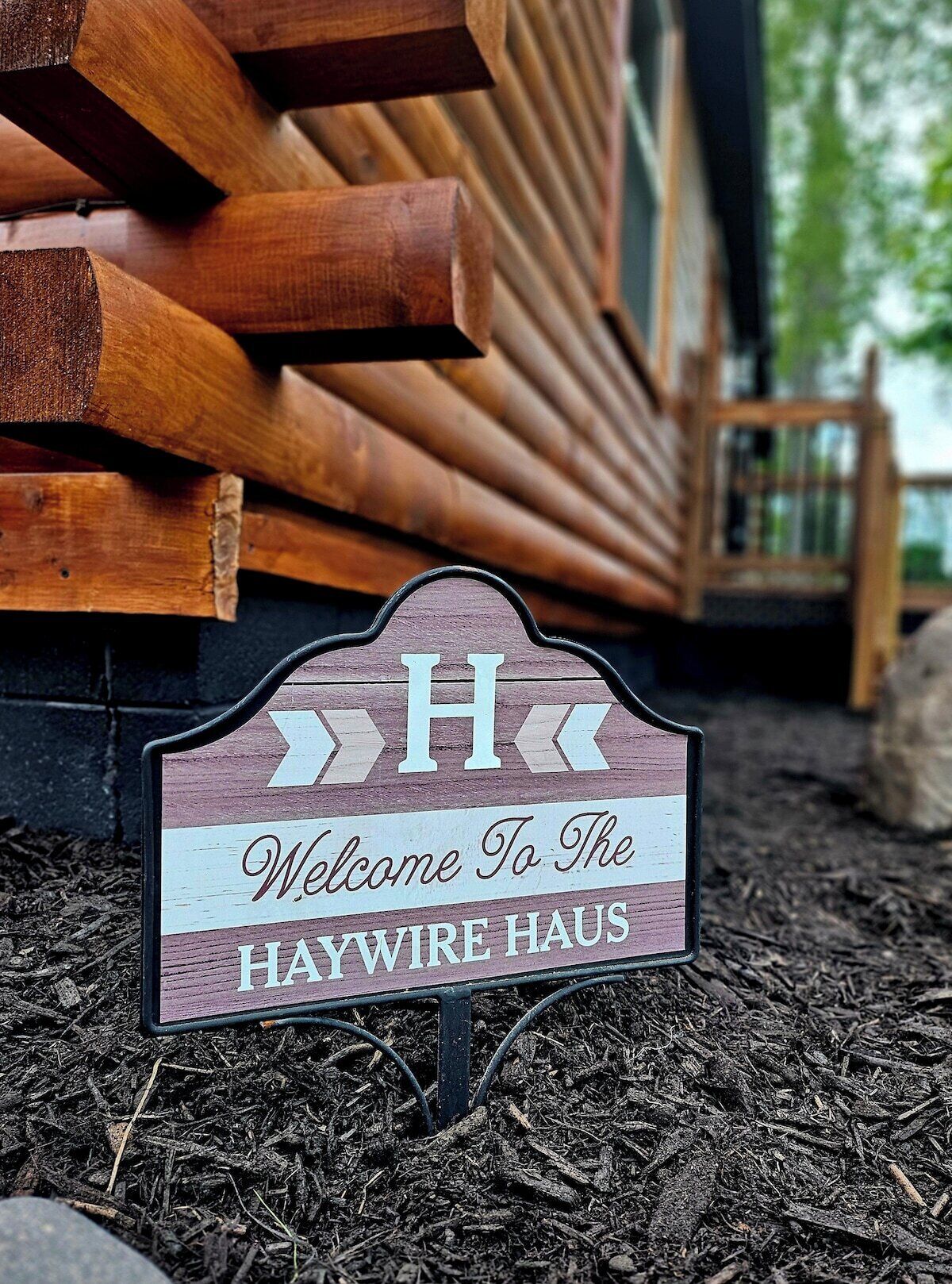 A welcome sign for Haywire Haus.