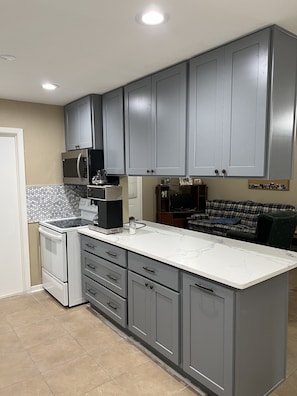 Fridge, microwave, oven, stovetop - Four bedroom river house located minutes away from Matagorda, TX and the beach. (Bay City)