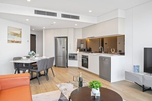 Fridge, microwave, oven, stovetop - CASSA ONE - Luxury Riverside Living in BNE CBD (Brisbane)