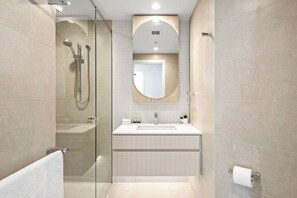 Shower, hair dryer, towels