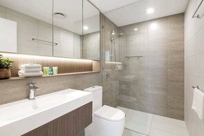 Shower, hair dryer, soap, shampoo