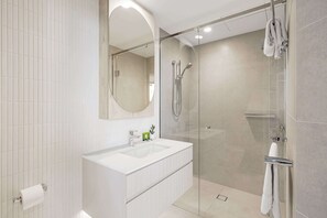 Shower, hair dryer, towels
