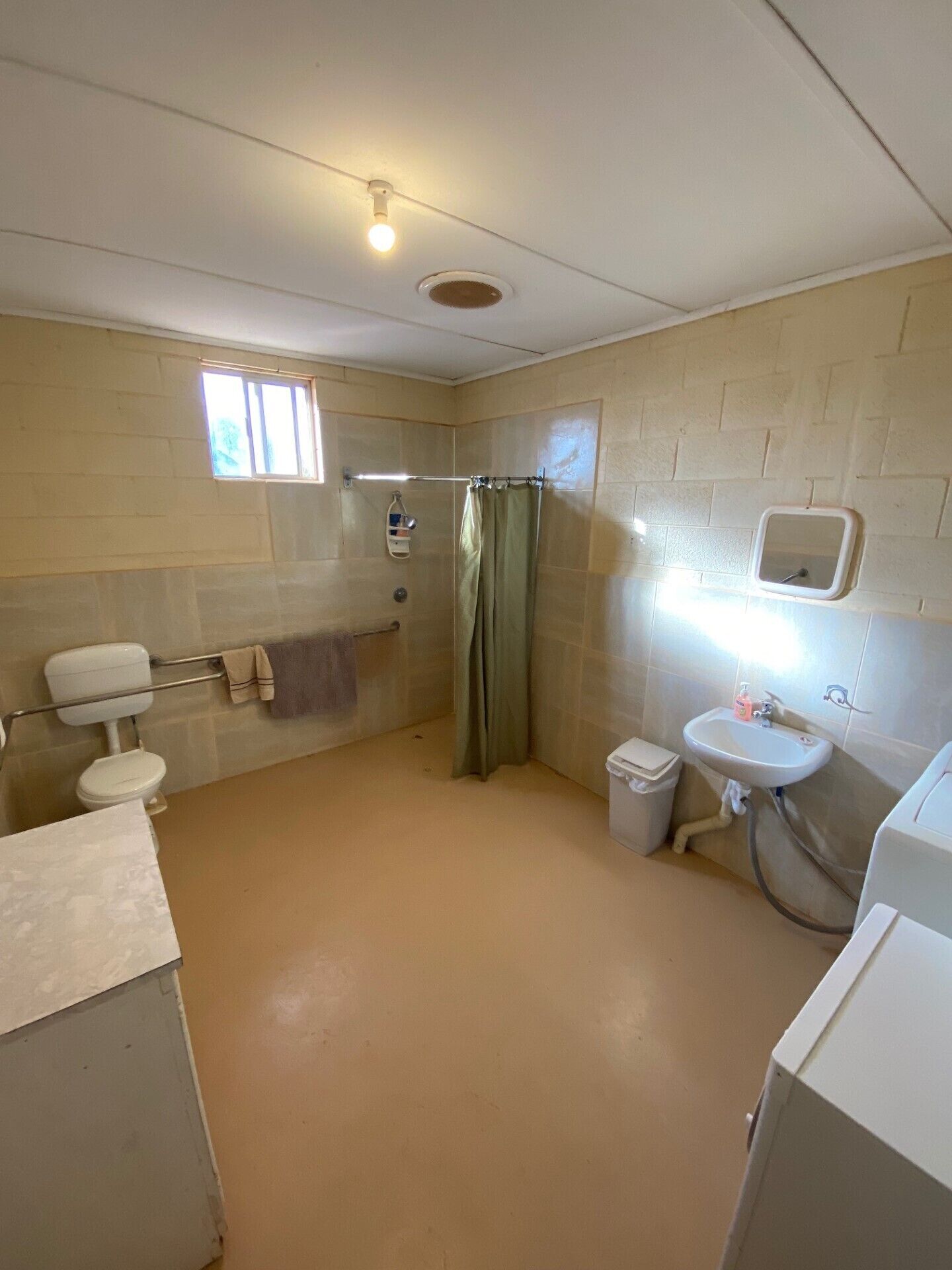 Shower, hair dryer, towels, toilet paper