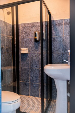 Traditionele bungalow | Badkamer | Handdoeken