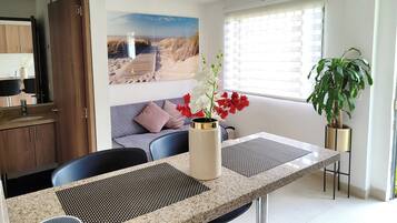 Standard Apartment, 1 Double Bed with Sofa bed | Living area | 40-inch Smart TV with cable channels