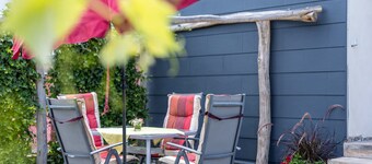 Apartment 'Baumelt' with Private Terrace, Shared Garden and Wi-Fi