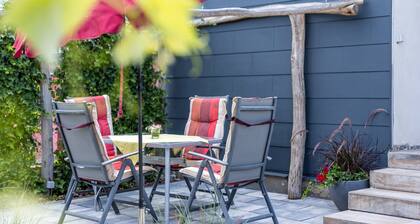 Apartment 'Baumelt' with Private Terrace, Shared Garden and Wi-Fi