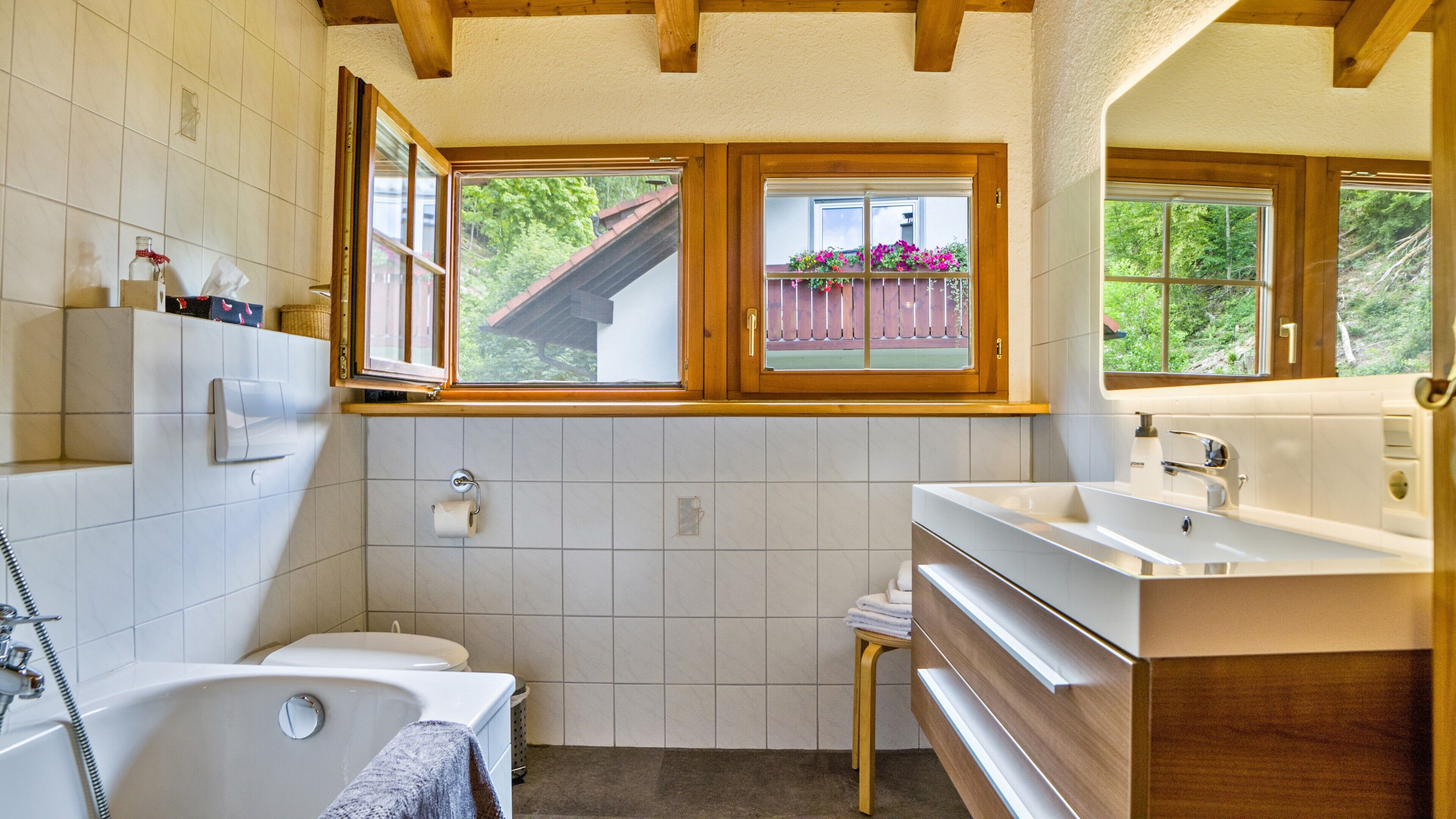 Bathtub, hair dryer, towels