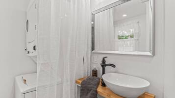 Hair dryer, towels, soap, shampoo