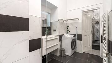 Hair dryer, towels, soap, shampoo