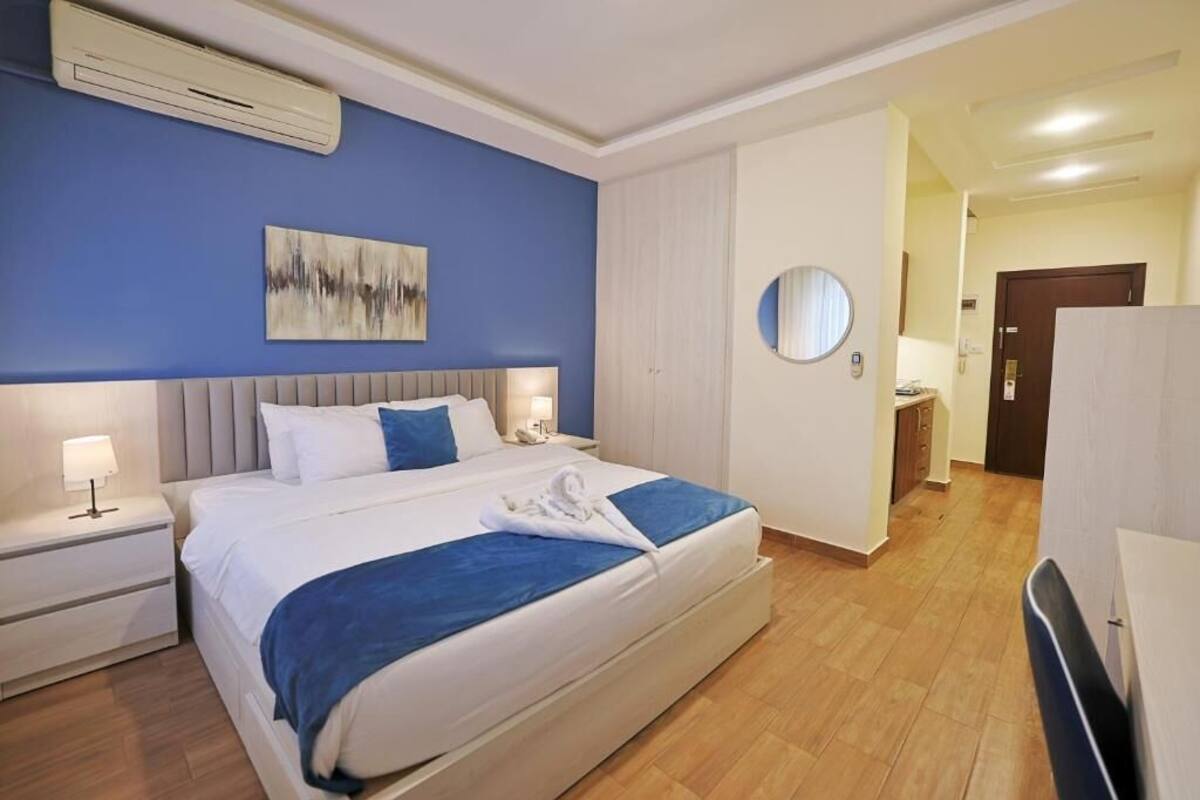 Egyptian cotton sheets, premium bedding, laptop workspace