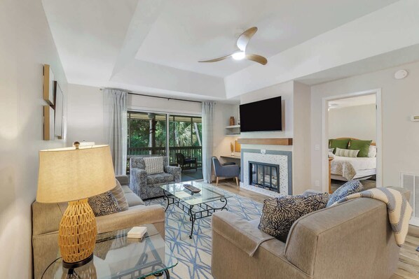 Flat-screen TV, books, offices - Serene Lagoon Retreat Screened Porch & Deck (Hilton Head Island)