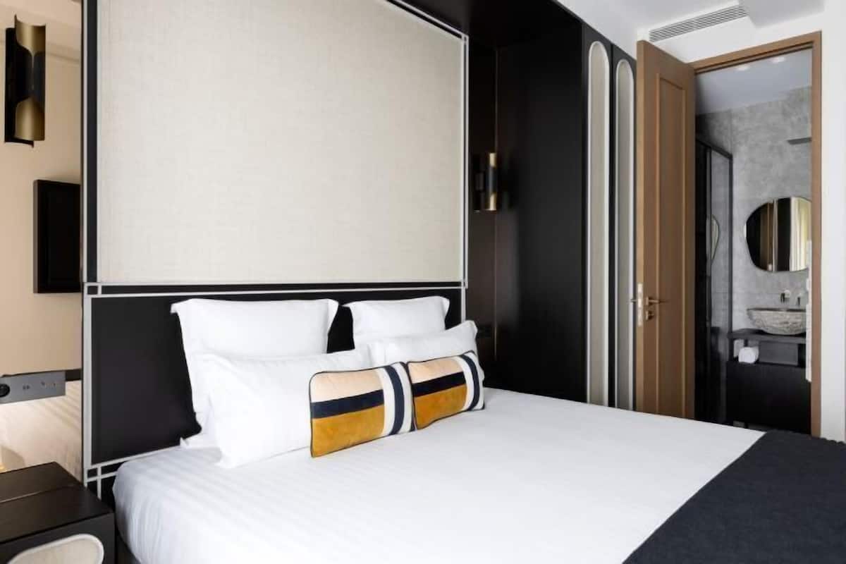 Premium bedding, pillow-top beds, in-room safe, blackout curtains