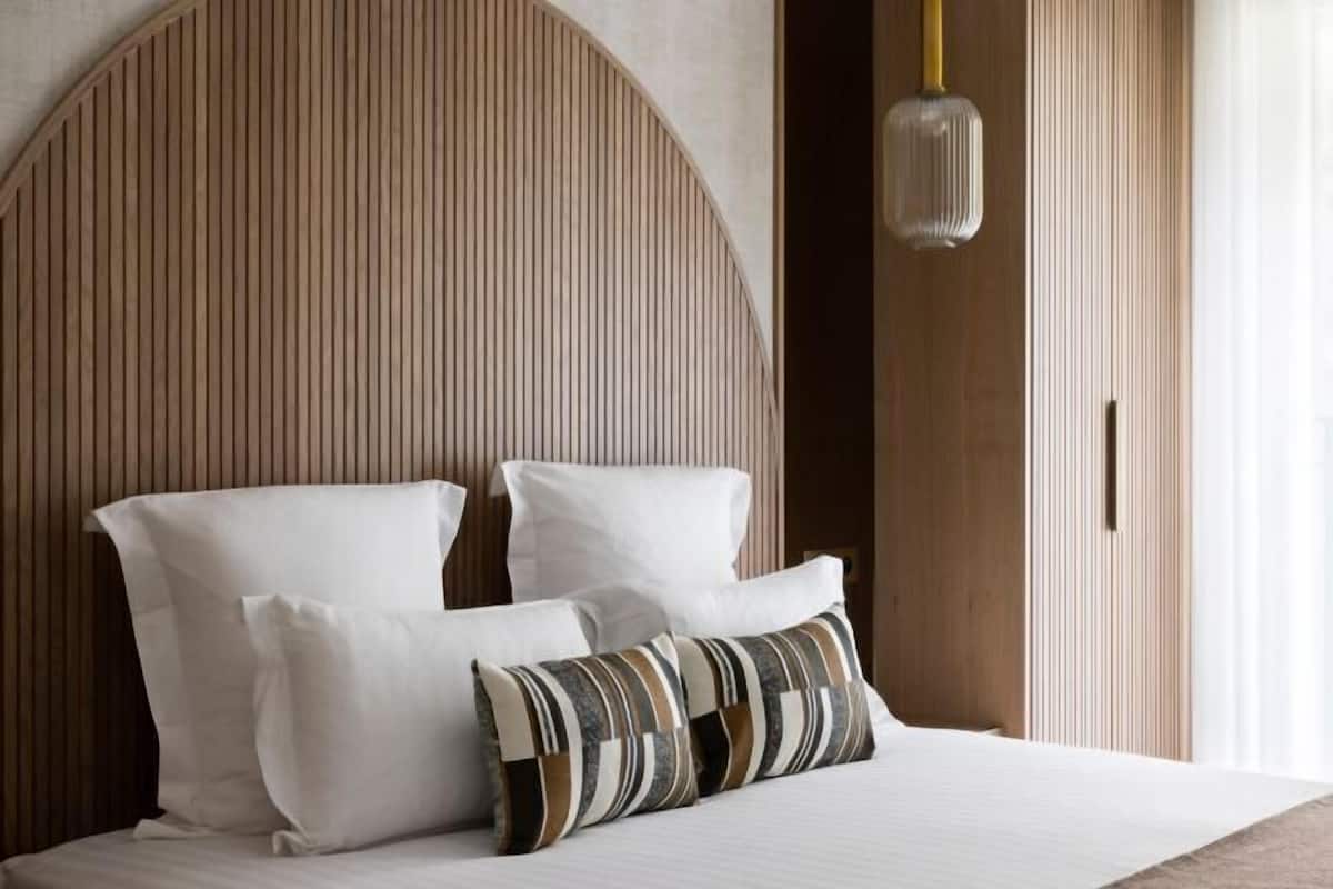 Premium bedding, pillow-top beds, in-room safe, individually decorated