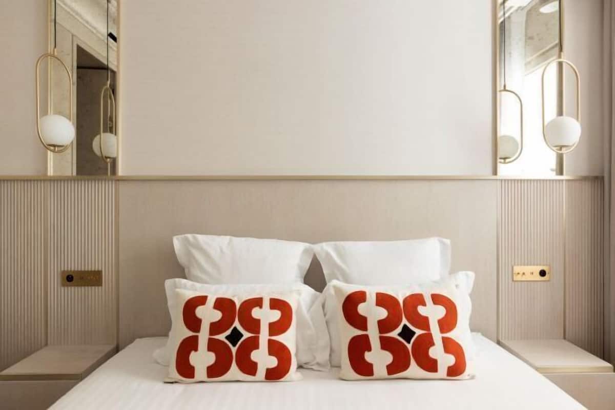 Premium bedding, pillow-top beds, in-room safe, blackout curtains