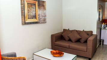 Executive Room | Living room | 45-inch Smart TV with digital channels