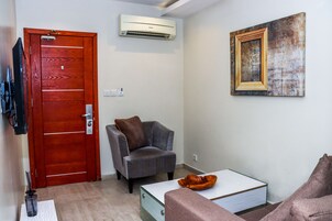 Executive Room | Living room | 45-inch Smart TV with digital channels