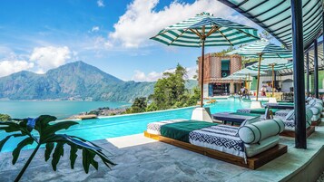 2 outdoor pools, pool umbrellas, sun loungers