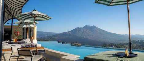 2 outdoor pools, pool umbrellas, sun loungers