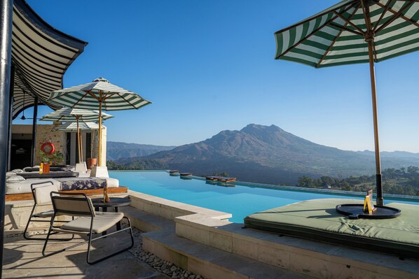 2 outdoor pools, pool umbrellas, sun loungers
