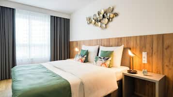 Apartment, 1 Bedroom | Premium bedding, in-room safe, laptop workspace, blackout drapes