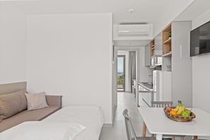 Elite Suite, Terrace, Ground Floor | Living area - Kouros Stone Suites (Rhodes)