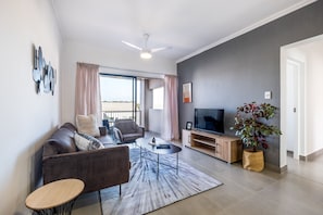 Departamento exclusivo | Área de sala de estar | Televisión de pantalla plana, Netflix y servicios de streaming