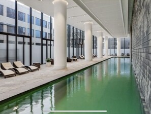 Relax by the pool surrounded by clean lines and a soothing atmosphere.