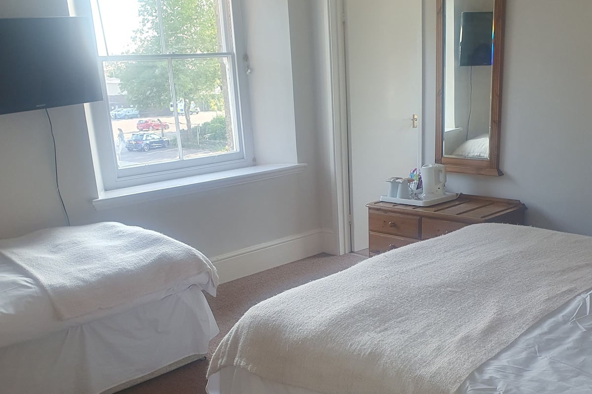 Family Double or Twin Room | Iron/ironing board, bed sheets