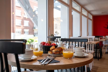 Daily buffet breakfast (EUR 14 per person)